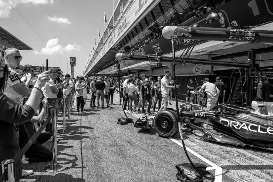 Formula 1 Grand Prix pit lane with fans