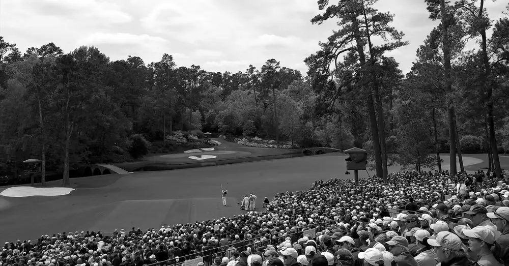 Crowd following a major golf tournament